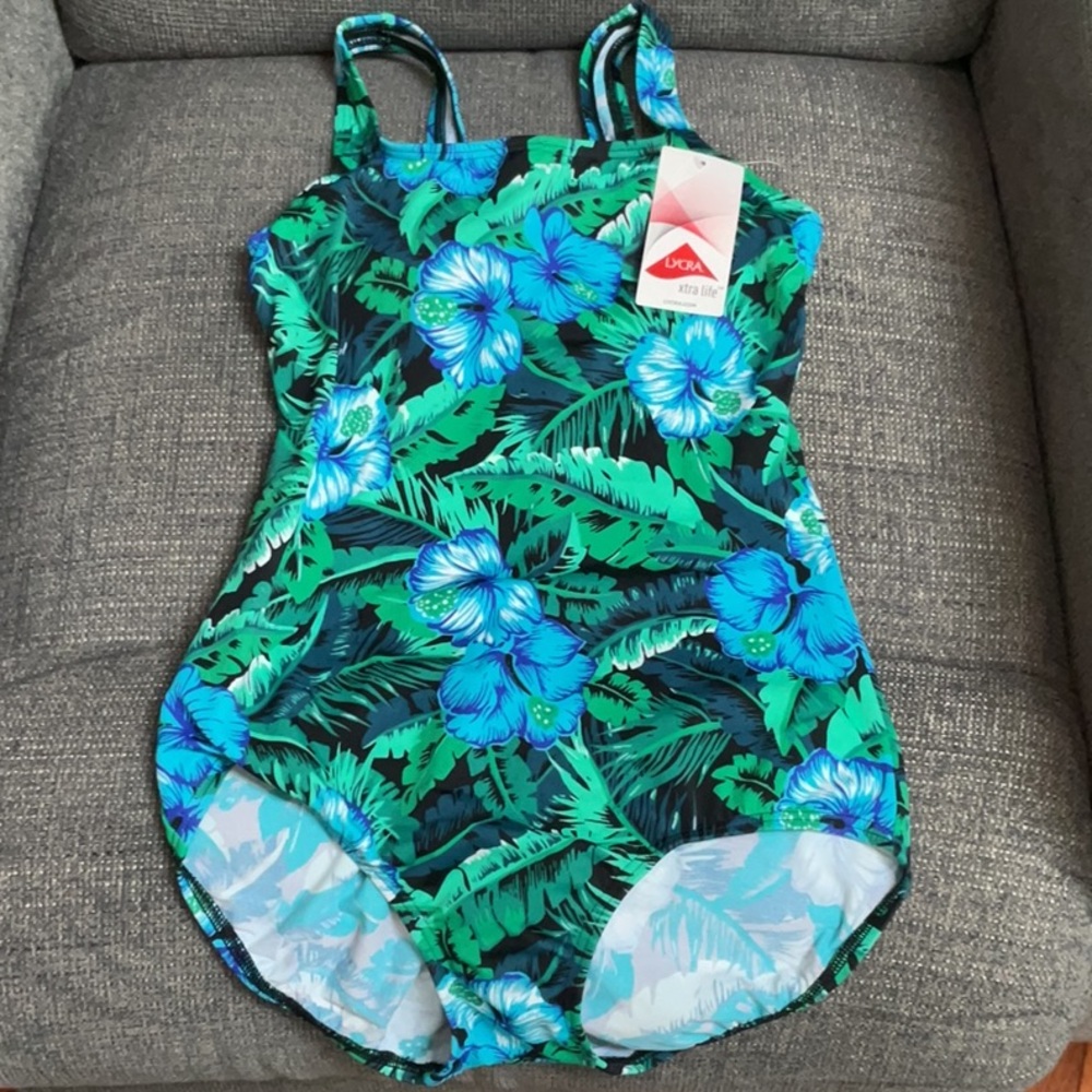 New with tags. Blue and Green One Piece Swimsuit with Tropical Print